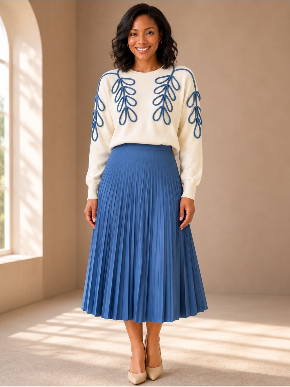 Aleeza Paris Set With Pleated Midi Skirt and Embroidered Knit Top.